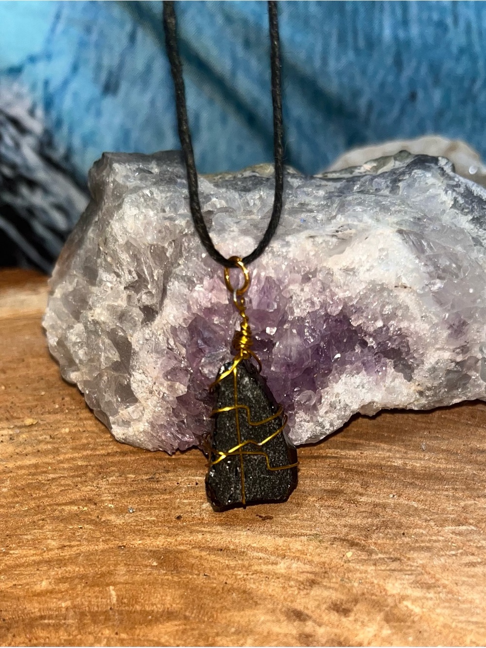 Black Stone Pendant Necklace with Gold Wire Wrap